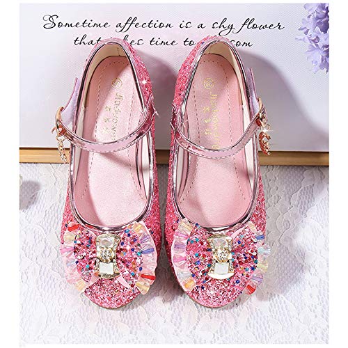 Adorable pink glittery loafers with bow and jewelry designed by Cadidi Dinos 