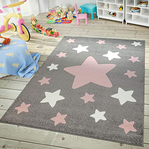 Pink and grey carpet with white stars of different sizes