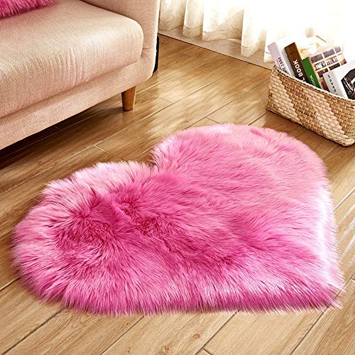 Pink heart-shaped carpet for a Girly room