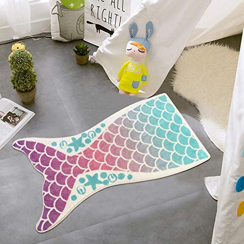 Mermaid shaped rug for a girly bedroom