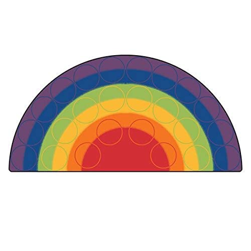 Rainbow shaped rug for a girly bedroom