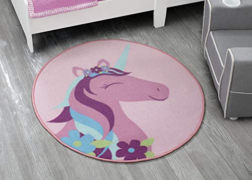 Round and pink carpet with unicorn